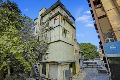 OYO Flagship Hotel Happiness Inn Near Tdi Mall